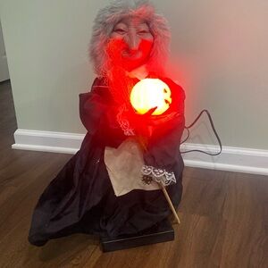 Ghoul like motion halloween figure witch